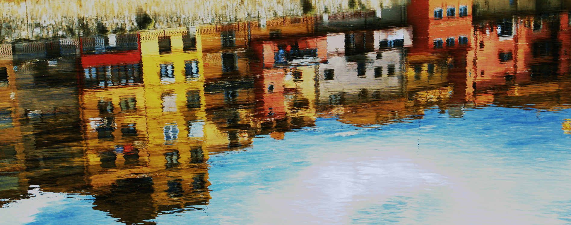 Buildings reflected in the water